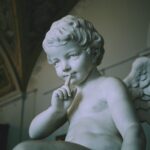 Cherubim Evolution: From Sphinx-Like Beings to Cupids